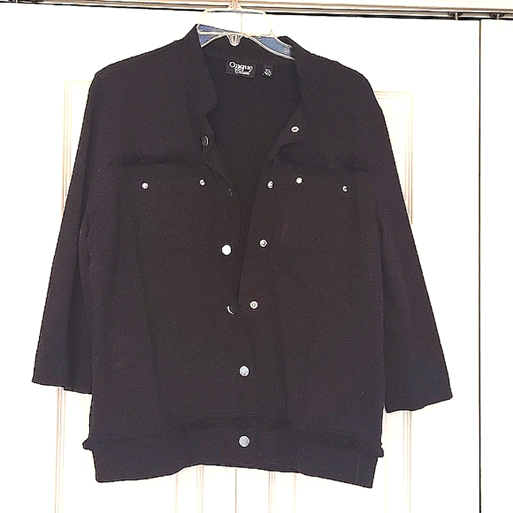 Black snap front jacket.